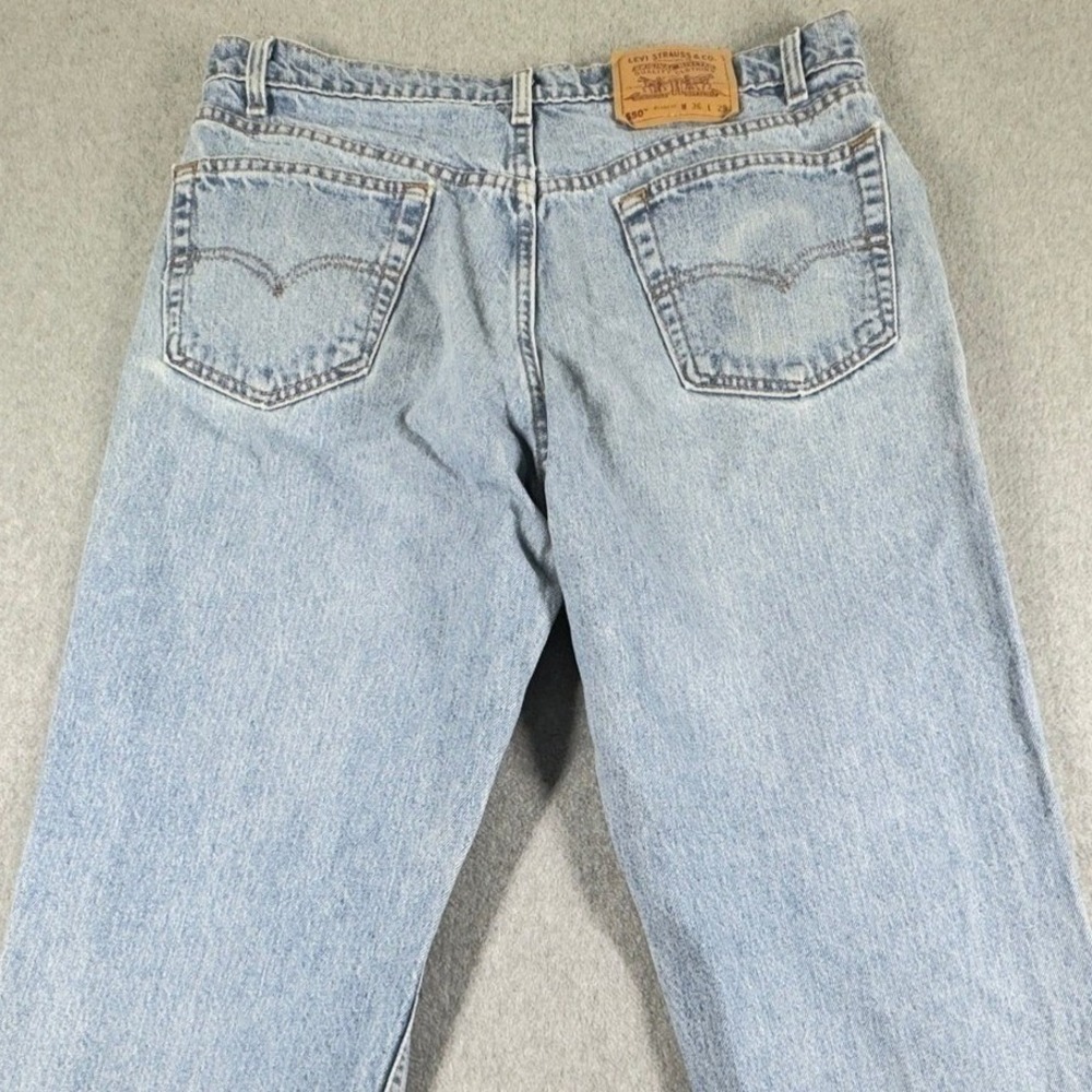Vintage Levi's 550 Relaxed Fit Jeans Mens 36x29 Light Wash Distressed USA 90s